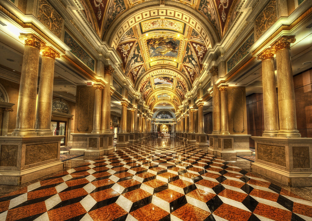 Ornate gilded hall with pipe organ